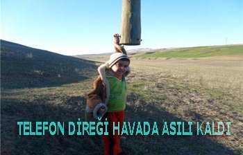 TELEFON DİREĞİ HAVADA ASILI KALDI